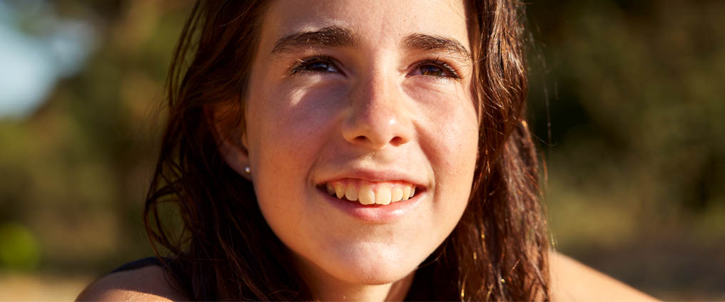 Zahnfleischrückgang - Ursachen und Behandlung